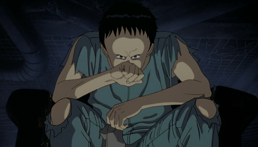 Tetsuo in una scena di Akira (1988) di Katsuhiro Ōtomo 