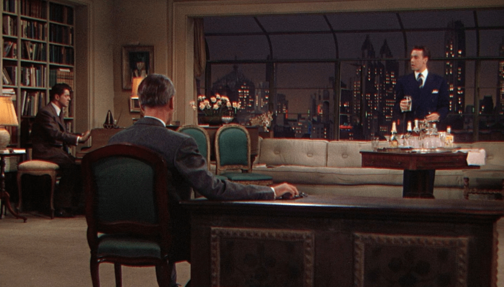 John Dall, Farley Granger e James Stewart in una scena di Nodo alla gola (1948) di Alfred Hitchcock