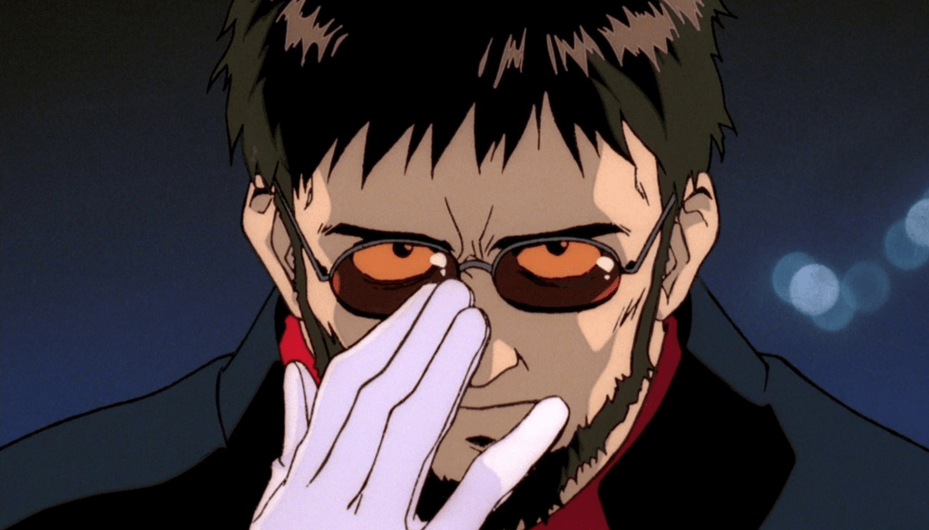 Ikari in una scena di Neon Genesis Evangelion (1995 - 1996) di Hideaki Anno