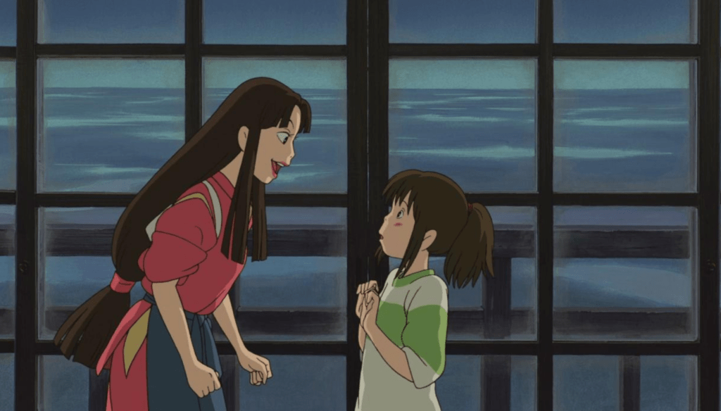 Chihiro e Lin in una scena di La città incantata (2001) di Hayao Miyazaki
