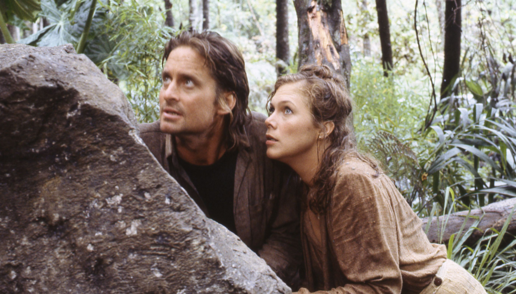 Michael Douglas e Kathleen Turner in una scena di All'inseguimento della pietra verde (1984) di Robert Zemeckis