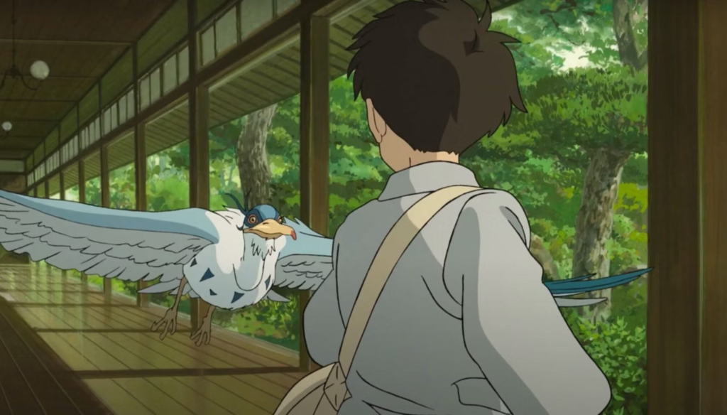 L'airone e Mahito in una scena de Il ragazzo e l'airone (2023) di Hayao Miyazaki