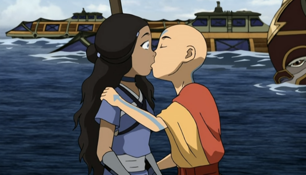 Aang bacia Katara in una scena di Avatar - La leggenda di Aang (2005-2008) di Michael Dante DiMartino e Bryan Konietzko