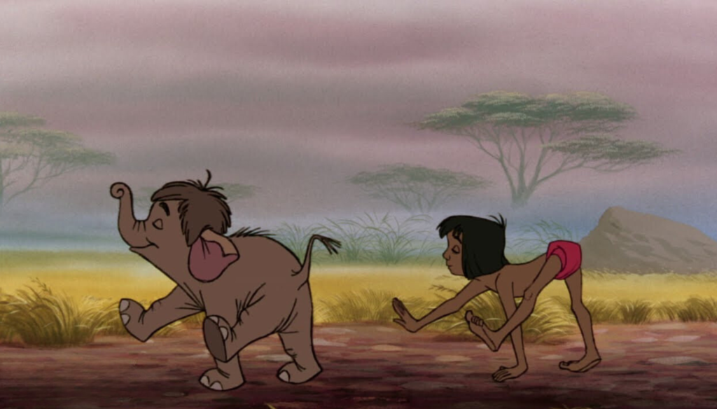 Mowgli e l'elefante in una scena de Il libro della giungla (1967) di Wolfgang Reitherman, il diciannovesimo Classico Disney