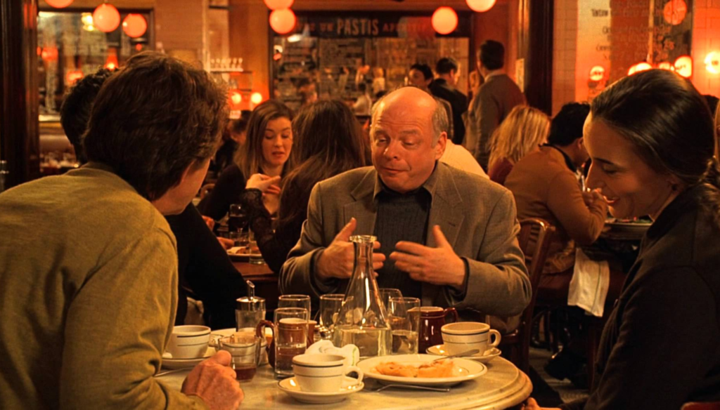 Wallace Shawn in una scena di Melinda e Melinda (2004) di Woody Allen