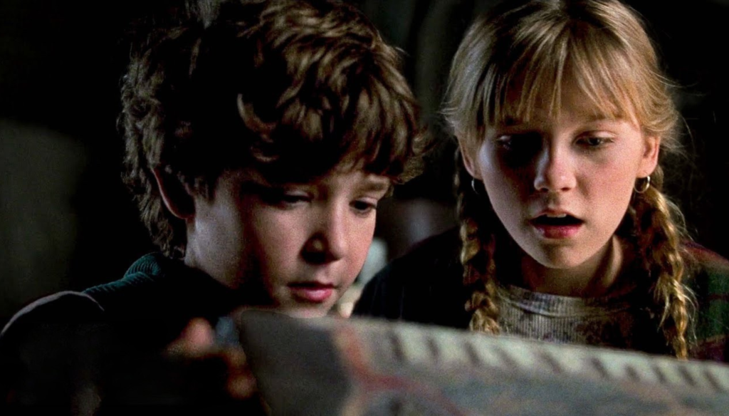 Bradley Pierce e Kirsten Dunst in una scena di Jumanji (1995) di Joe Johnston